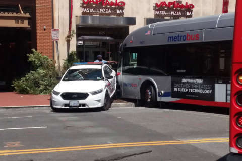 Bus almost crashes into building near Gallery Place Metro, injuries reported