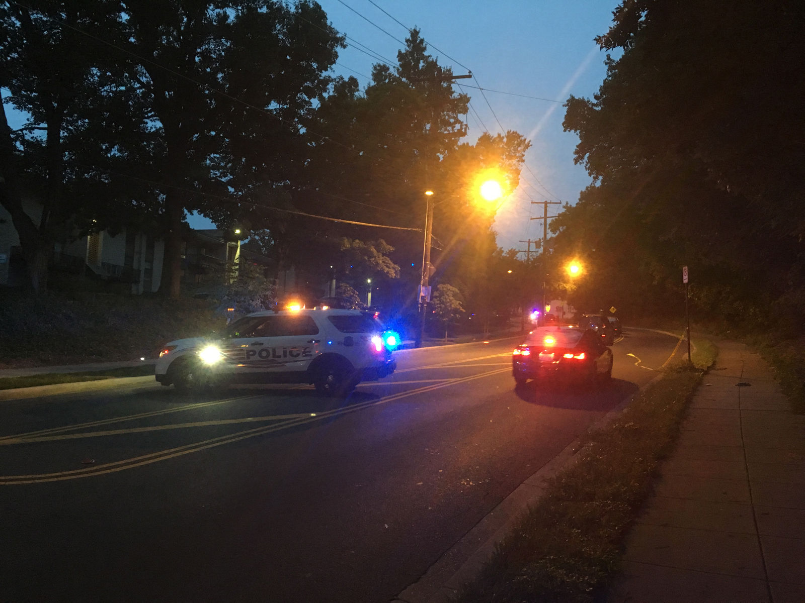 Police say the suspect attempted to flee from an arrest and then pulled a gun on an officer. The officer then shot the suspect, who is believed to have suffered non-life threatening wounds. (WTOP/Mike Murillo)