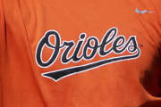 Baltimore Orioles' Chris Davis tosses the ball during a spring training baseball workout in Sarasota, Fla., Monday, Feb. 20, 2017. (AP Photo/David Goldman)