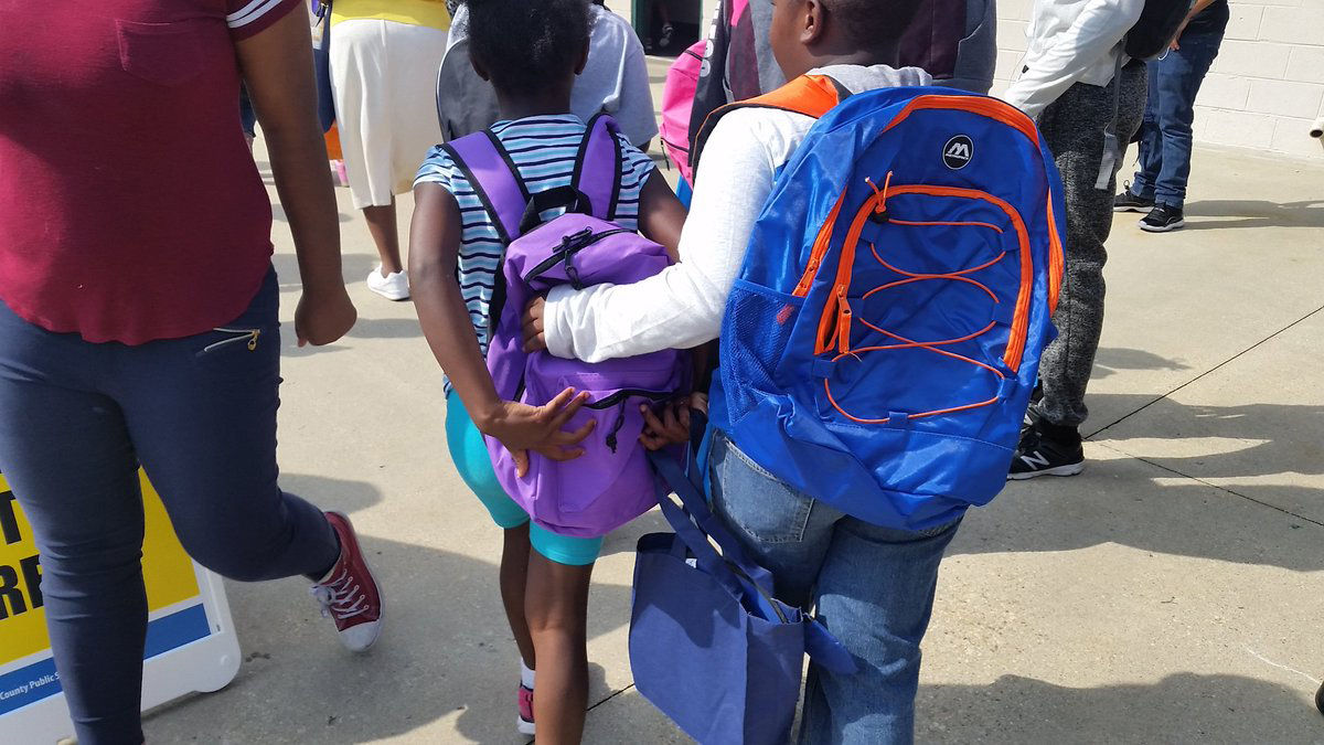 More than 10,000 backpacks were handed out at the Back-to-School Fair in Prince George's County. (WTOP/Kathy Stewart)