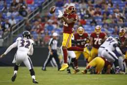 Washington Redskins wide receiver Terrelle Pryor (11) bobbles a pass attempt in front of Baltimore Ravens strong safety Eric Weddle in the first half of a preseason NFL football game, Thursday, Aug. 10, 2017, in Baltimore. (AP Photo/Patrick Semansky)
