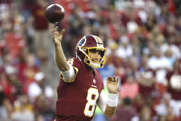 Washington Redskins quarterback Kirk Cousins (8) passes the ball during the first half of an NFL preseason football game against the Green Bay Packers in Landover, Md., Saturday, Aug. 19, 2017. (AP Photo/Alex Brandon)