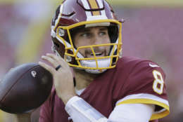 Washington Redskins quarterback Kirk Cousins (8) warms up before an NFL preseason football game against the Green Bay Packers in Landover, Md., Saturday, Aug. 19, 2017. (AP Photo/Mark Tenally)