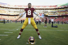 Washington Redskins quarterback Kirk Cousins (8) warms up before an NFL preseason football game against the Green Bay Packers in Landover, Md., Saturday, Aug. 19, 2017. (AP Photo/Alex Brandon)