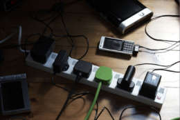 different power cables on floor one green