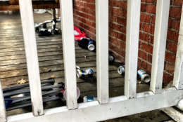 Beer cans on off-campus housing at the University of Virginia. University president Teresa Sullivan says the Wertland Street Block Party promotes unhealthy behavior through excessive drinking and puts an unneccesary strain on law enforcement. (WTOP/Neal Augenstein)