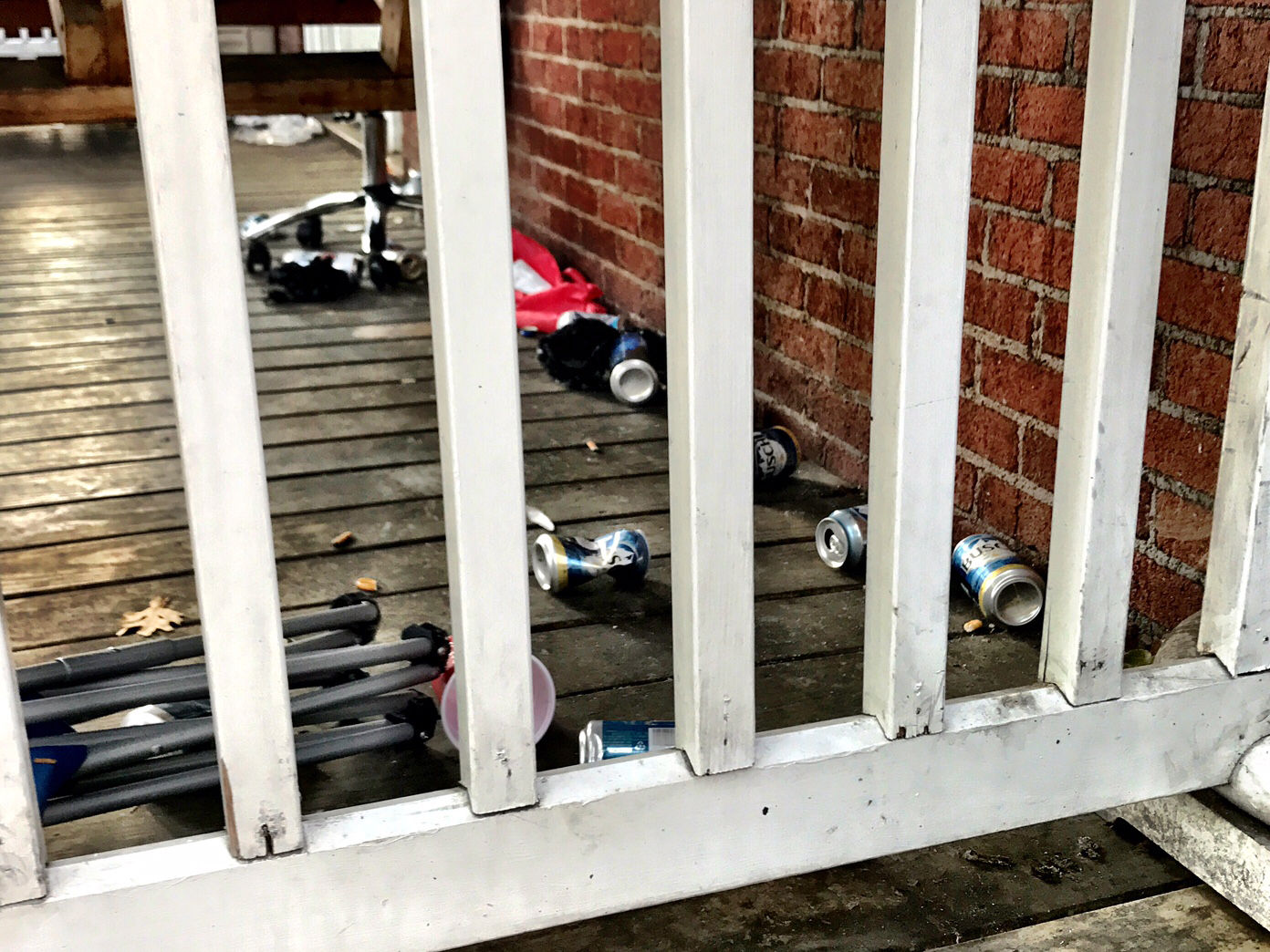 Beer cans on off-campus housing at the University of Virginia. University president Teresa Sullivan says the Wertland Street Block Party promotes unhealthy behavior through excessive drinking and puts an unneccesary strain on law enforcement. (WTOP/Neal Augenstein)