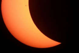 The eclipse captured with an orange filter Dobsonian telescope. (Courtesy WTOP listener)
