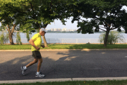 Al Richmond, 78, trains for his 42nd Marine Corps Marathon during a run with WTOP's Sarah Beth Hensley at Hains Point. He had run every Marine Corps Marathon since the race started in 1976. (WTOP/Sarah Beth Hensley)