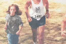 In 1998, Richmond’s granddaughter unexpectedly jumped in and run the last 50 yards of the race with him – it one of his most cherished memories from the 41 Marine Corps Marathon races he has run. (Courtesy Al Richmond)