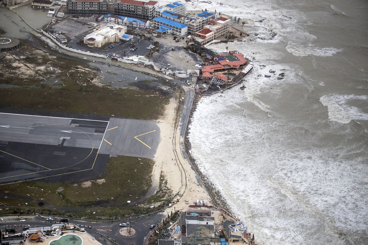 This Sept. 6, 2017 photo provided by the Dutch Defense Ministry shows the coast in the aftermath of Hurricane Irma, in St. Maarten. Irma cut a path of devastation across the northern Caribbean, leaving thousands homeless after destroying buildings and uprooting trees. Significant damage was reported on the island that is split between French and Dutch control. (Gerben Van Es/Dutch Defense Ministry via AP)