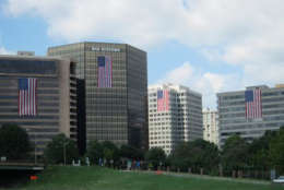 The tradition of draping huge American flags from the tops of Rosslyn office buildings is now in its 16th year. (Courtesy Rosslyn Business Improvement District).