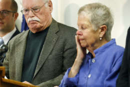 Mary Lyon, right, wipes a tear as she and John Lyon, parents of Sheila and Katherine Lyon, speak to the media after a plea by Lloyd Lee Welch Jr., for the killings of their daughters in 1975, in Bedford County Circuit Court in Bedford, Va., Tuesday, Sept. 12, 2017. Welch plead guilty to two first degree murder charges and was sentenced to two consecutive 48-year prison terms. (AP Photo/Steve Helber)