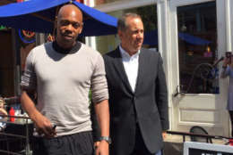 Comedians Dave Chappelle and Jerry Seinfeld exiting The Diner in D.C. after filming a segment for Seinfeld's show "Comedians in Cars Get." (WTOP/Kristi King)