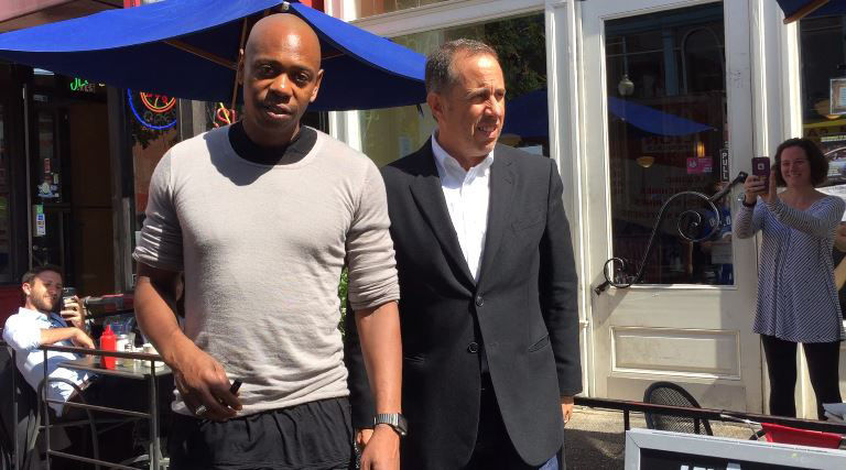 Comedians Dave Chappelle and Jerry Seinfeld exiting The Diner in D.C. after filming a segment for Seinfeld's show "Comedians in Cars Get." (WTOP/Kristi King)