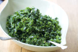 This Oct. 7, 2013 photo shows sesame kale salad in Concord, N.H. This dish is simple, healthy and would go well on the Thanksgiving table. (AP Photo/Matthew Mead)