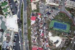This Sept. 6, 2017 photo provided by the Dutch Defense Ministry shows storm damage in the aftermath of Hurricane Irma, in St. Maarten. Irma cut a path of devastation across the northern Caribbean, leaving thousands homeless after destroying buildings and uprooting trees. Significant damage was reported on the island that is split between French and Dutch control. (Gerben Van Es/Dutch Defense Ministry via AP)