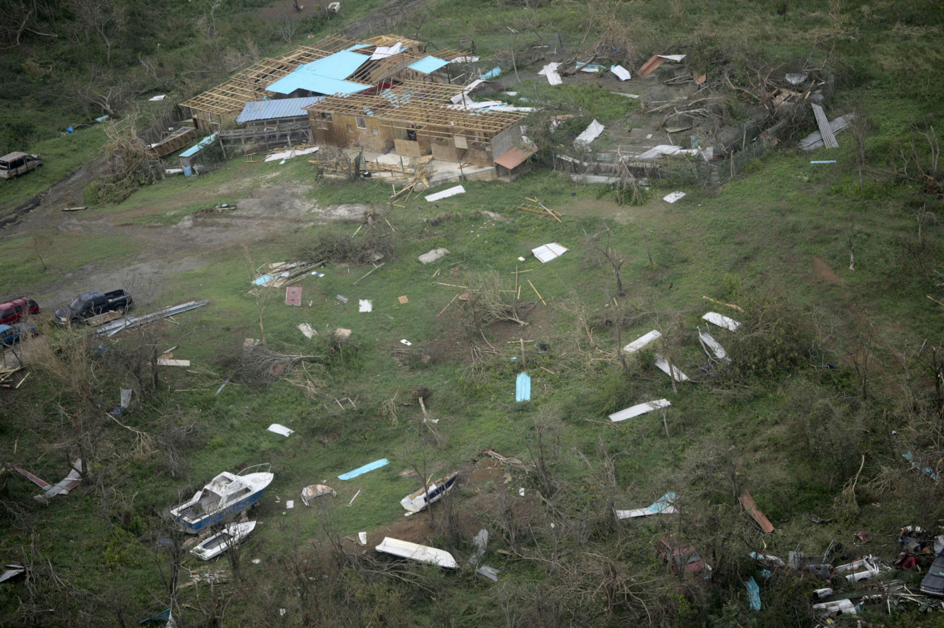 Devastated buildings from the island of Culebra, which suffered damages by the passage of Hurricane Irma, are seen form the air, in Puerto Rico, Thursday, Sept. 7, 2017. About a million people were without power in the U.S. territory after Irma passed just to the north, lashing the island with heavy wind and rain. Nearly 50,000 also were without water. (AP Photo/Carlos Giusti)