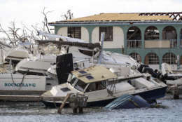 This undated photo provided on Sunday Sept. 10, 2017 by the British Ministry of Defence, shows the destruction in Road Town, Tortola, British Virgin Islands left by Hurricane Irma. The death toll from Hurricane Irma has risen to 22 as the storm continues its destructive path through the Caribbean. (Joel Rouse/MOD via AP)
