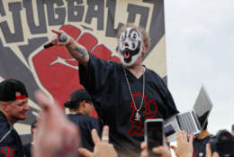 Violent J, a member of the rap group Insane Clown Posse, yells on stage before speaking to juggalos, as supporters of the group are known, in front of the Lincoln Memorial in Washington during a rally, Saturday, Sept. 16, 2017, to protest and demand that the FBI rescind its classification of the juggalos as "loosely organized hybrid gang." (AP Photo/Pablo Martinez Monsivais)