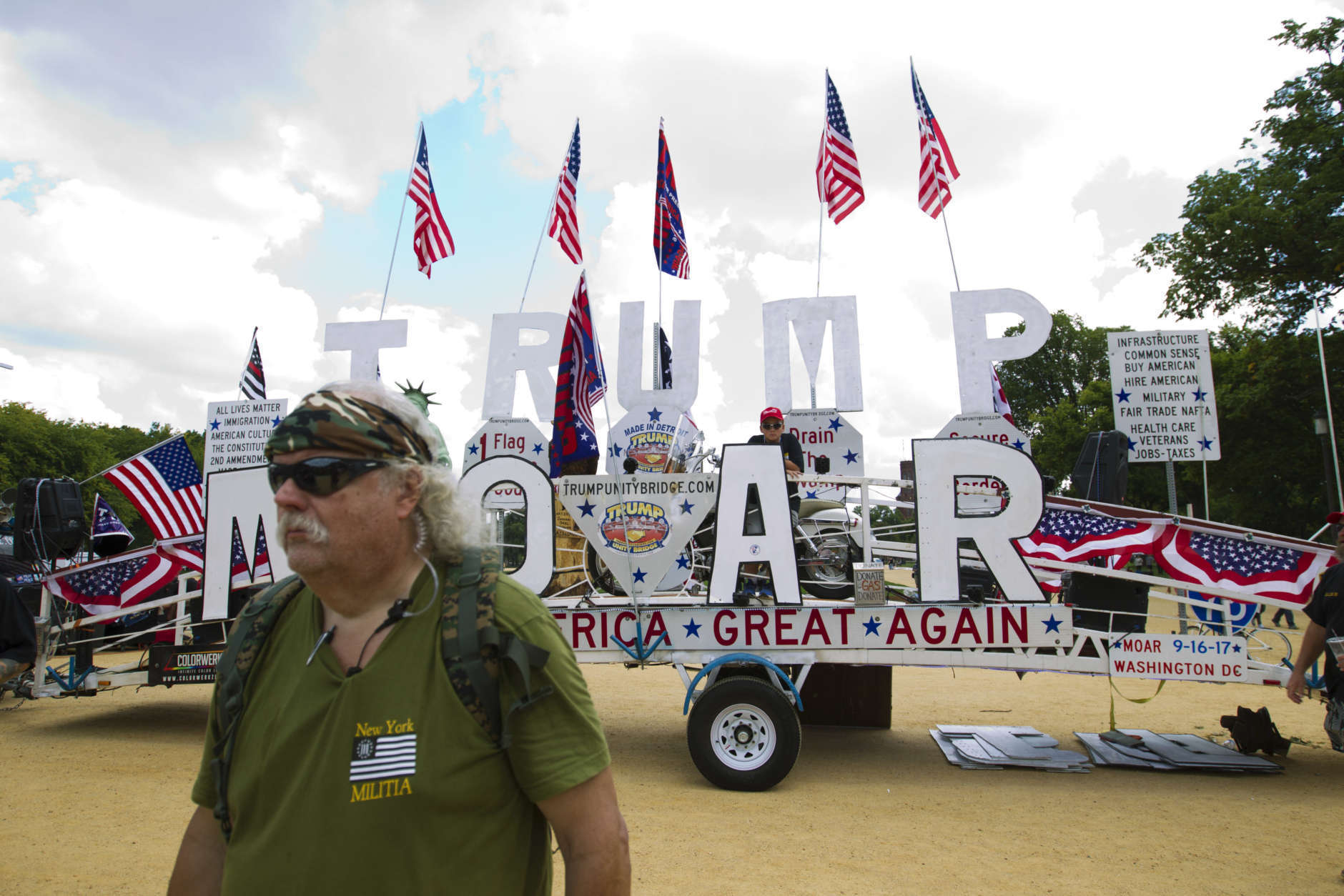 People gather on the National Mall in Washington, Saturday, Sept. 16, 2017, to attend a rally in support of President Donald Trump in what organizers are calling 'The Mother of All Rallies." ( AP Photo/Jose Luis Magana)