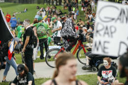 Juggalos, as supporters of the rap group Insane Clown Posse are known, gather in front of the Lincoln Memorial in Washington during a rally, Saturday, Sept. 16, 2017, to protest and demand that the FBI rescind its classification of the juggalos as "loosely organized hybrid gang." (AP Photo/Pablo Martinez Monsivais)