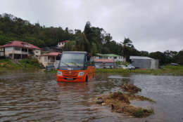 This photo provided by Frank Phazian shows flooding caused by Hurricane Maria near Le Raizet, Guadeloupe, Tuesday, Sept. 19, 2017. (Frank Phazian via AP)