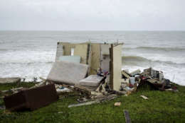 A completely ruined house is seen in El Negro community a day after the impact of Hurricane Maria, in Puerto Rico, Thursday, September 21, 2017. As of Thursday evening, Maria was moving off the northern coast of the Dominican Republic with winds of 120 mph (195 kph). The storm was expected to approach the Turks and Caicos Islands and the Bahamas late Thursday and early Friday. (AP Photo/Carlos Giusti)
