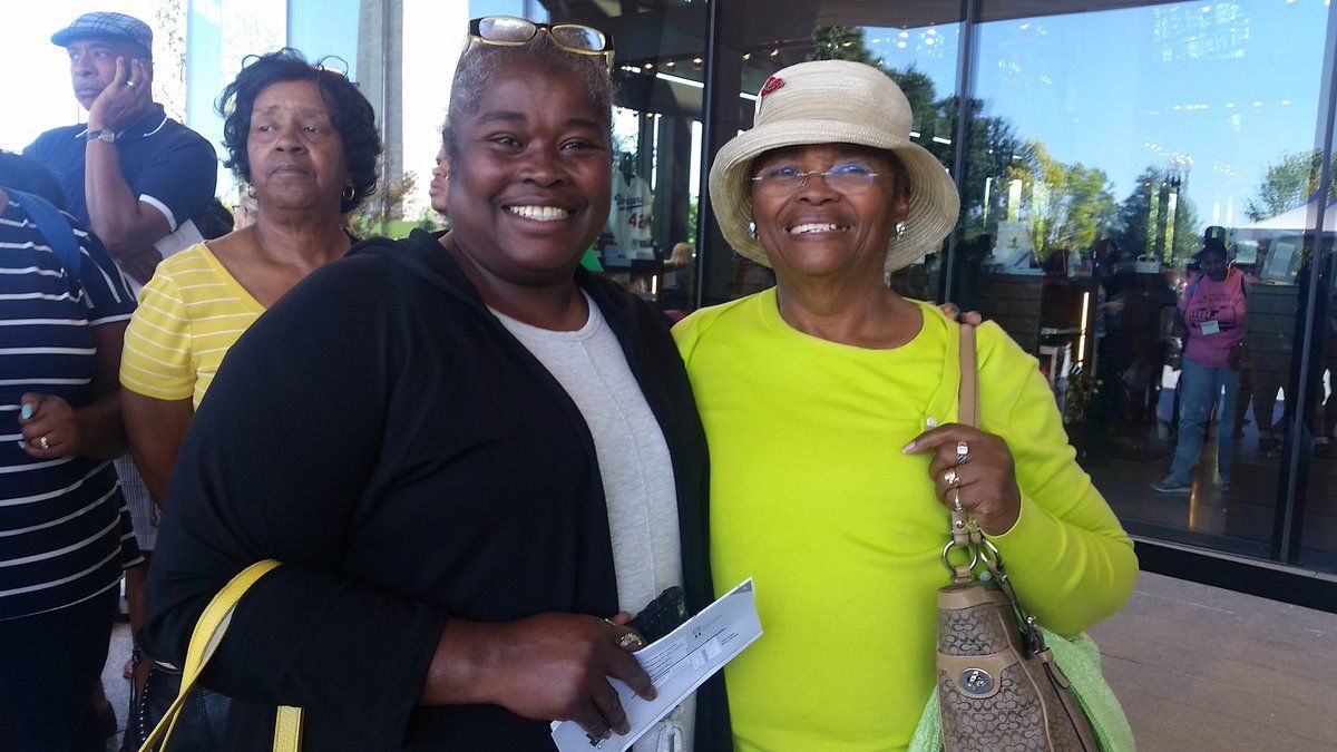 Bernadette Crosson (left) and her mother Helen James (right) visit the museum on Saturday. "To witness this on the anniversary weekend, it's such a fantastic feeling," said James, a 14-year cancer survivor. "Seventy one-years old, born 1946 ... I was born during segregation ... to come here and experience this museum is just tearful." (WTOP/Kathy Stewart) 