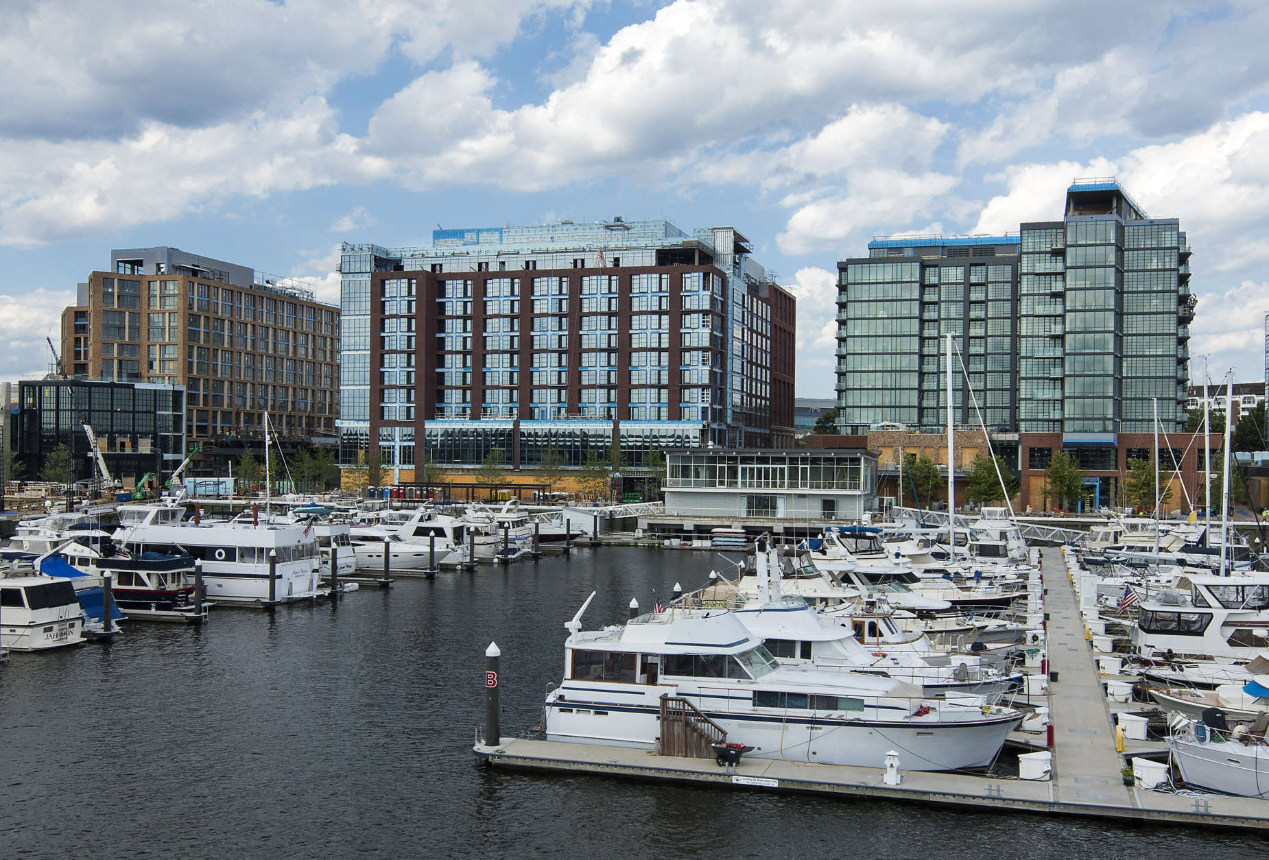 A view of the 309-slip marina and yacht club at The Warf. The D.C. project has revitalized a mile of shore along the Southwest Waterfront. More than 2,000 people are expected to live there and thousands more will work in shops, storefronts and office space. (Matthew Borkoski/PN Hoffman)