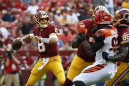 Washington Redskins quarterback Kirk Cousins (8) throws to a receiver in the first half of a preseason NFL football game against the Cincinnati Bengals, Sunday, Aug. 27, 2017, in Landover, Md. (AP Photo/Alex Brandon)