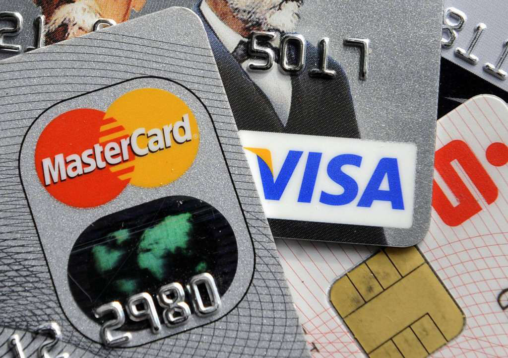 Parents usually like to give their college-age child a credit card in case of an emergency, but kids and parents have vastly different ideas of what constitutes an emergency. Here are some things you should know about getting your college age child a credit card. (AP Photo/Martin Meissner, File)