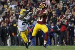 Washington Redskins wide receiver Jamison Crowder (80) pulls in a touchdown pass un pressure from Green Bay Packers cornerback Quinten Rollins (24) during the second half of an NFL football game in Landover, Md., Sunday, Nov. 20, 2016. (AP Photo/Alex Brandon)