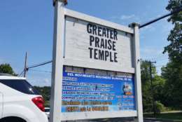 Last Sunday, as members of Greater Praise Temple Ministries opened up for services, they found racist messages taped to the church's front door. (WTOP/Kathy Stewart)