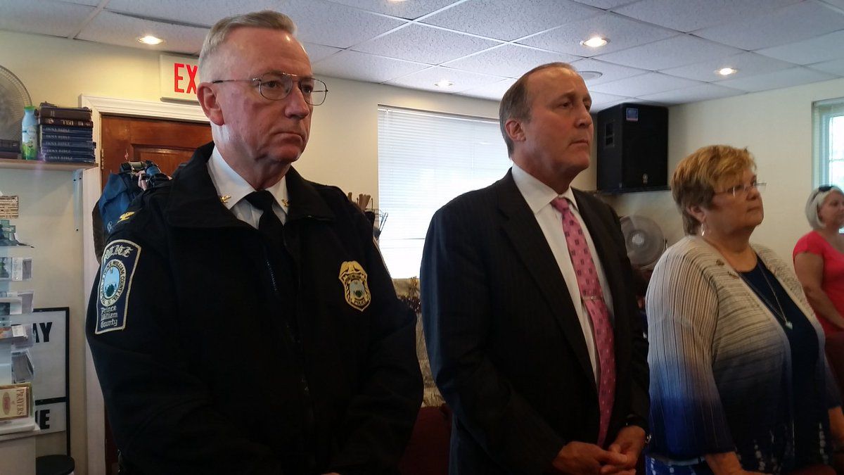 Prince William County Police Chief Barry Barnard attends service at Greater Praise Temple Ministries to support the church and its members after racist messages were left on the church's front door last week. (WTOP/Kathy Stewart) 