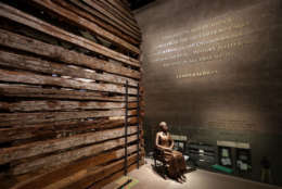 WASHINGTON, DC - SEPTEMBER 14:  A statue of Colorado pioneer and former slave Clara Brown is on display next to a preserved slave cabin at the Smithsonian's National Museum of African American History and Culture during the press preview on the National Mall September 14, 2016 in Washington, DC. Filled with exhibits and artifacts telling the story of the first Africans in the United States and their descendents, the 400,000-square-foot museum will open to the public on September 24.  (Photo by Chip Somodevilla/Getty Images)