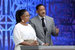WASHINGTON, DC - SEPTEMBER 24:   Oprah Winfrey, and Will Smith speak at the opening ceremony of the Smithsonian National Museum of African American History and Culture on September 24, 2016 in Washington, DC. The museum is opening thirteen years after Congress and President George W. Bush authorized its construction.   (Photo by Olivier Douliery-Pool/Getty Images)