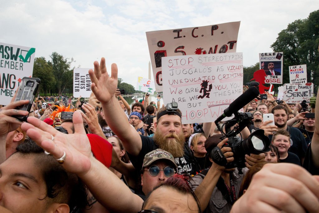 WASHINGTON, DC - SEPTEMBER 16:  People gather for a rally during the Juggalo March takes off from the Lincoln Memorial on the National Mall, on September 16, 2017 in Washington, DC. Fans of the band Insane Clown Posse. known as Juggalos, asre protesting their identification as gang by the FBI in a 2011 National Gang Threat Assessment,  (Photo by Tasos Katopodis/Getty Images)