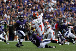 BALTIMORE, MD - SEPTEMBER 17: Quarterback DeShone Kizer #7 of the Cleveland Browns gets off a pass while being tackled by outside linebacker Terrell Suggs #55 of the Baltimore Ravens at M&amp;T Bank Stadium on September 17, 2017 in Baltimore, Maryland.  (Photo by Rob Carr/Getty Images)