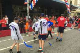 Players from the American Special Hockey Association play street hockey in front of the Capital One Arena Friday before a visit from the Caps' Alex Ovechkin. (WTOP/Mike Murillo)