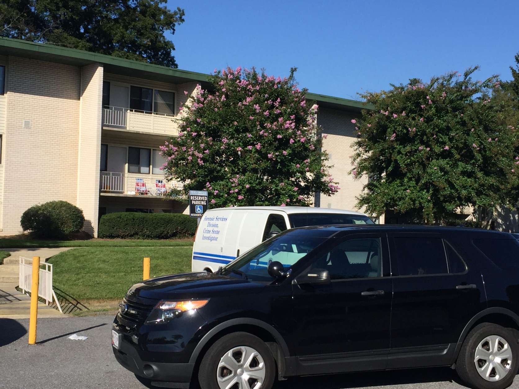 Two men were shot early Sunday at the Seven Springs Apartment Complex in College Park. One died after being taken to the hospital; the other is still listed in critical condition. (WTOP/John Domen)