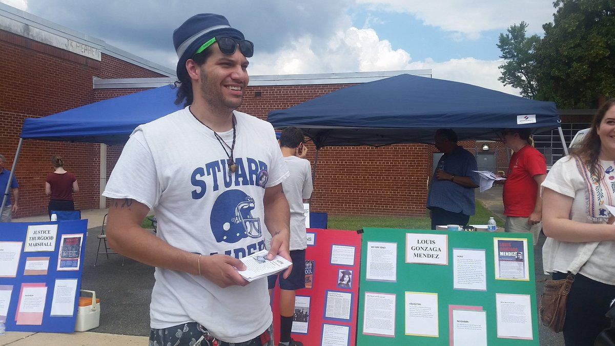 Matt Fernandez was campaigning outside of the high school, for the school to be renamed after Andy Anderson, a fallen war hero and J.E.B. Stuart graduate. (WTOP/Kathy Stewart) 
