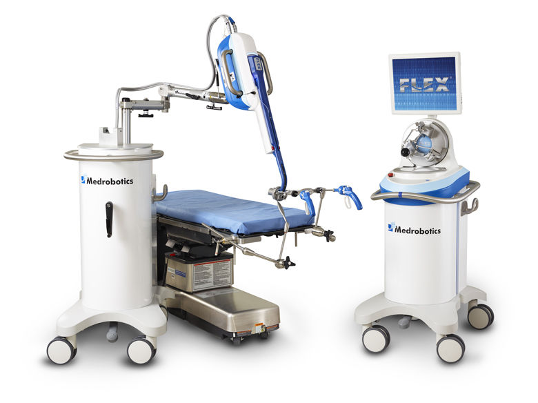 The Medrobotics Flex Robotic System for colorectal surgery has control handles for the surgeon to use that are similar to the function that it is performing. For example, scissor-like handles control the robot's cutting mechanism. (Courtesy George Washington University)