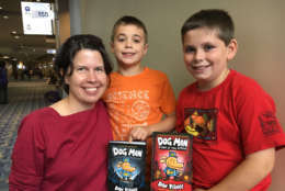Heather Cole and her sons, 10-year-old Nick and 9-year-old Aiden came to the National Book Festival to meet Dav Pilkey, author of the "Captain Underpants" series. (WTOP/Kate Ryan)