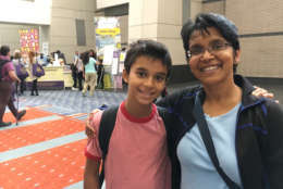 Joanne D'Souza and 12-year-old Elias Bernstein at the National Book Festival. (WTOP/Kate Ryan) 