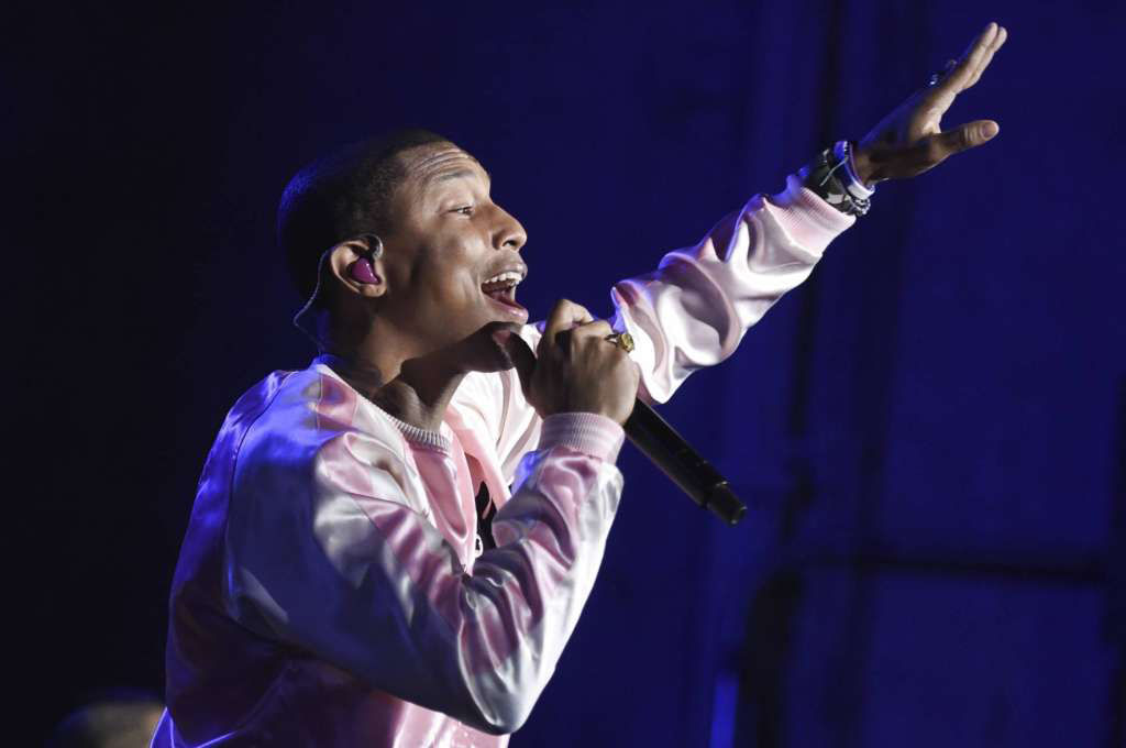 Pharrell Williams will join the Dave Matthews Band, Justin Timberlake, Ariana Grande and other special guests as part of the "Concert for Charlottesville." (Photo by Richard Shotwell/Invision/AP, File)