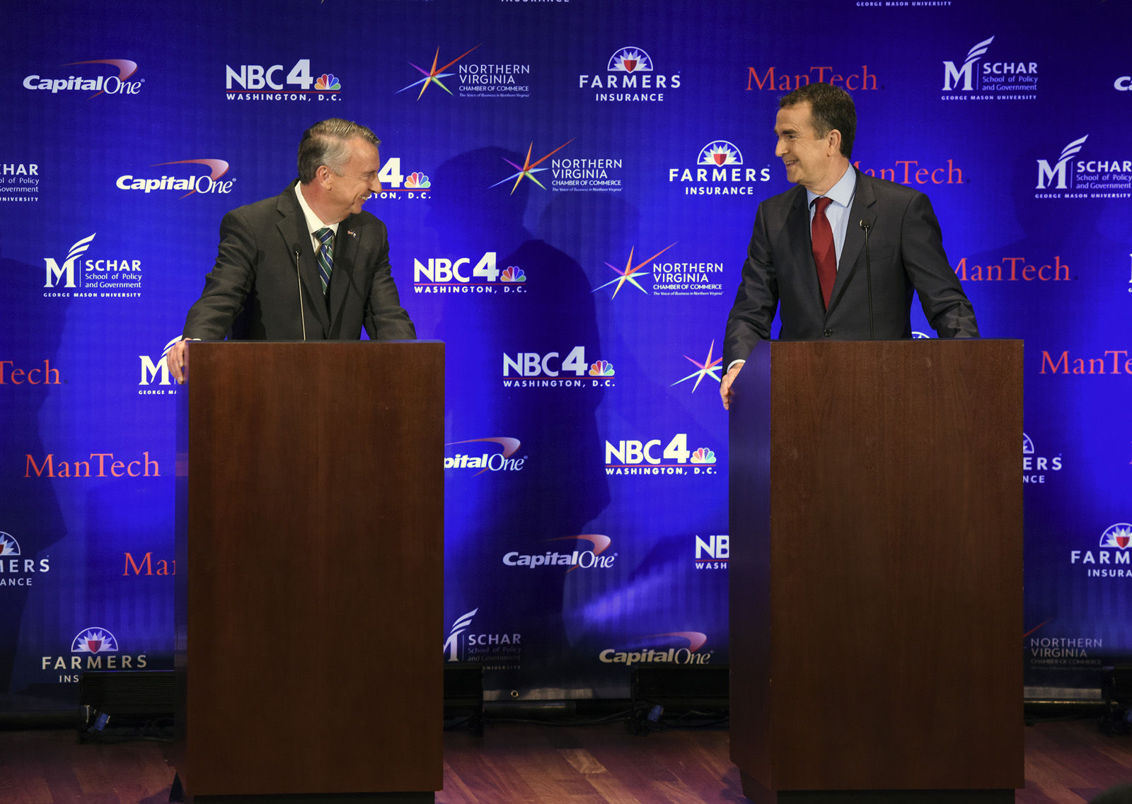MCLEAN, VA - SEPTEMBER 19:
Republican candidate Ed Gillespie, left, and Lt. Gov. Ralph Northam, Democrat, greet each other before the start of the Gubernatorial debate on September, 19, 2017 in McLean, VA.
(Pool Photo by Bill O'Leary/The Washington Post)