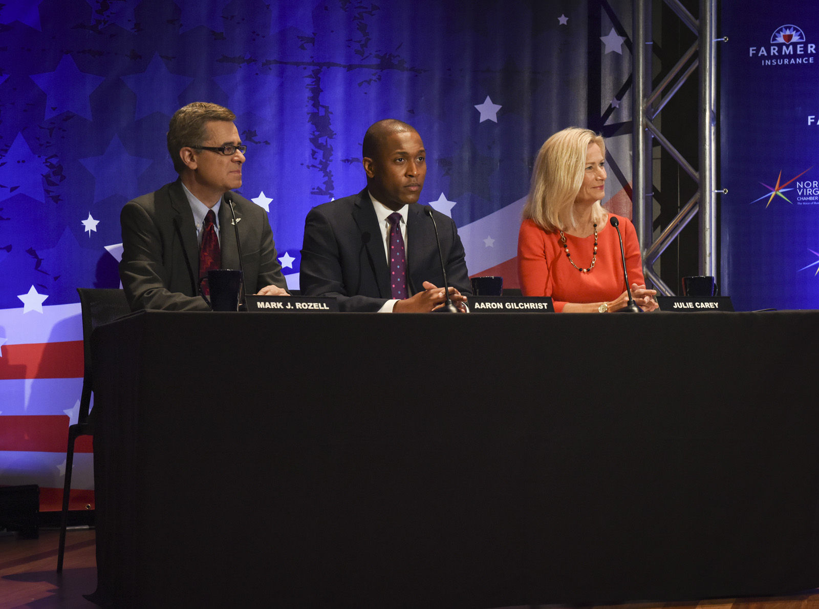 MCLEAN, VA - SEPTEMBER 19:
The panel for tonight's gubernatorial debate between Republican candidate Ed Gillespie, and Lt. Gov. Ralph Northam, Democrat, on September, 19, 2017 in McLean, VA. From left are Mark J. Rozell, Aaron Gilchrist, and Julie Carey.
(Pool Photo by Bill O'Leary/The Washington Post)