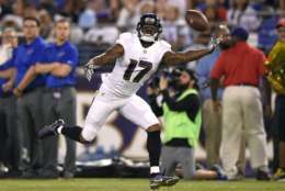 Baltimore Ravens wide receiver Mike Wallace reaches but can't make the catch on a pass in the first half of a preseason NFL football game against the Buffalo Bills, Saturday, Aug. 26, 2017, in Baltimore. (AP Photo/Nick Wass)