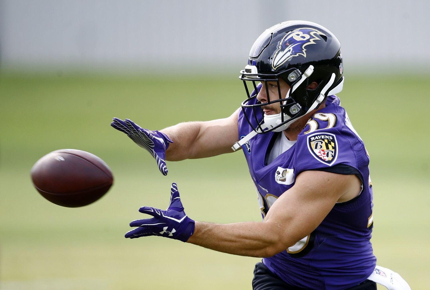 Baltimore Ravens running back Danny Woodhead runs a drill during an NFL football training camp practice in Owings Mills, Md., Tuesday, Aug. 8, 2017. (AP Photo/Patrick Semansky)